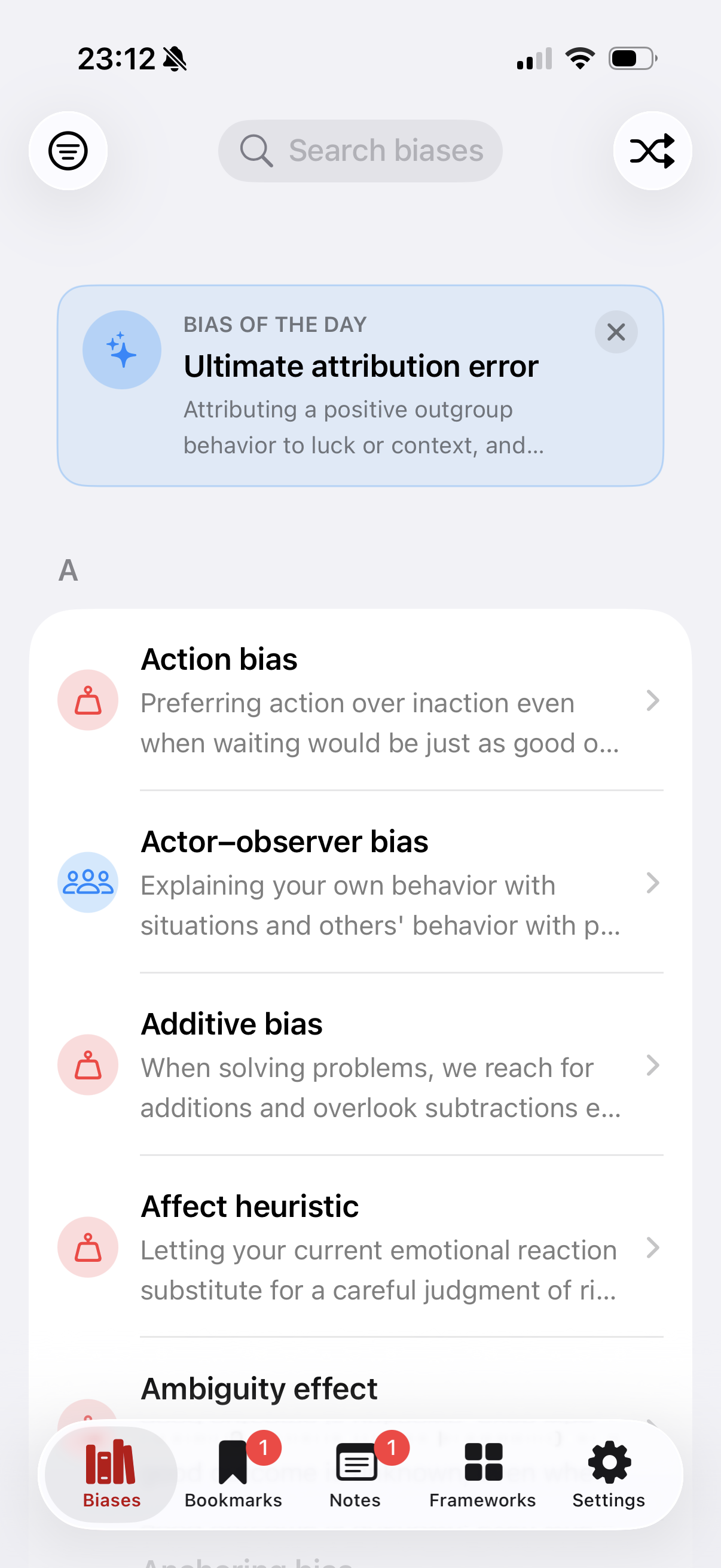 The Bias Handbook app, the Biases tab: a searchable A–Z list, Bias of the Day, and the bottom tab bar.